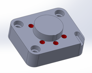 Metal Filament A 3D model of a metal box coated with red dots, created using desktop metal technology.