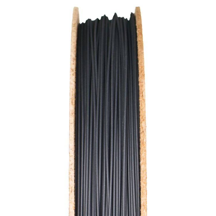 R3DS Boron Carbide 3D printing filament on a spool, showcasing black filament strands, relevant for metal and ceramic filament applications.