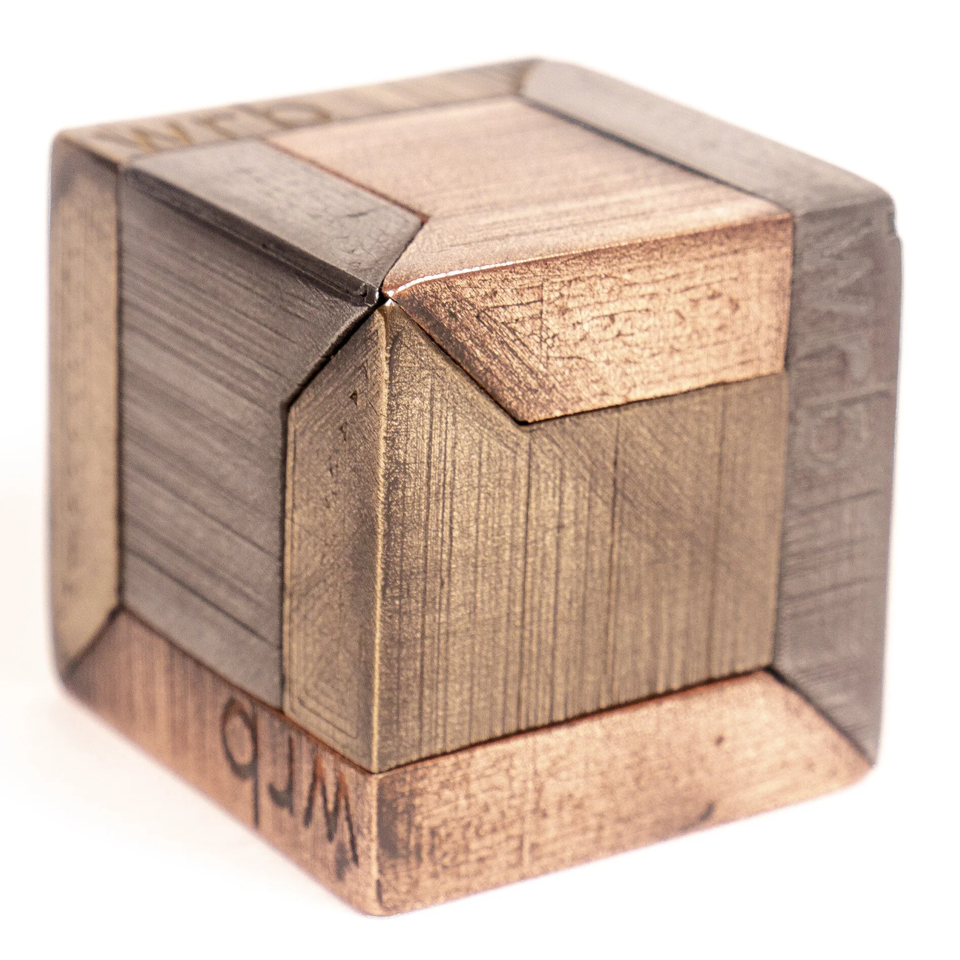 Metal 3D printed cube showcasing Filamet™ material with distinct textures and finishes, demonstrating advanced metal printing applications.