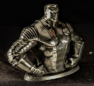 Metal 3D printed figurine showcasing advanced additive manufacturing capabilities of The Virtual Foundry's Filamet™ technology for affordable metal printing.